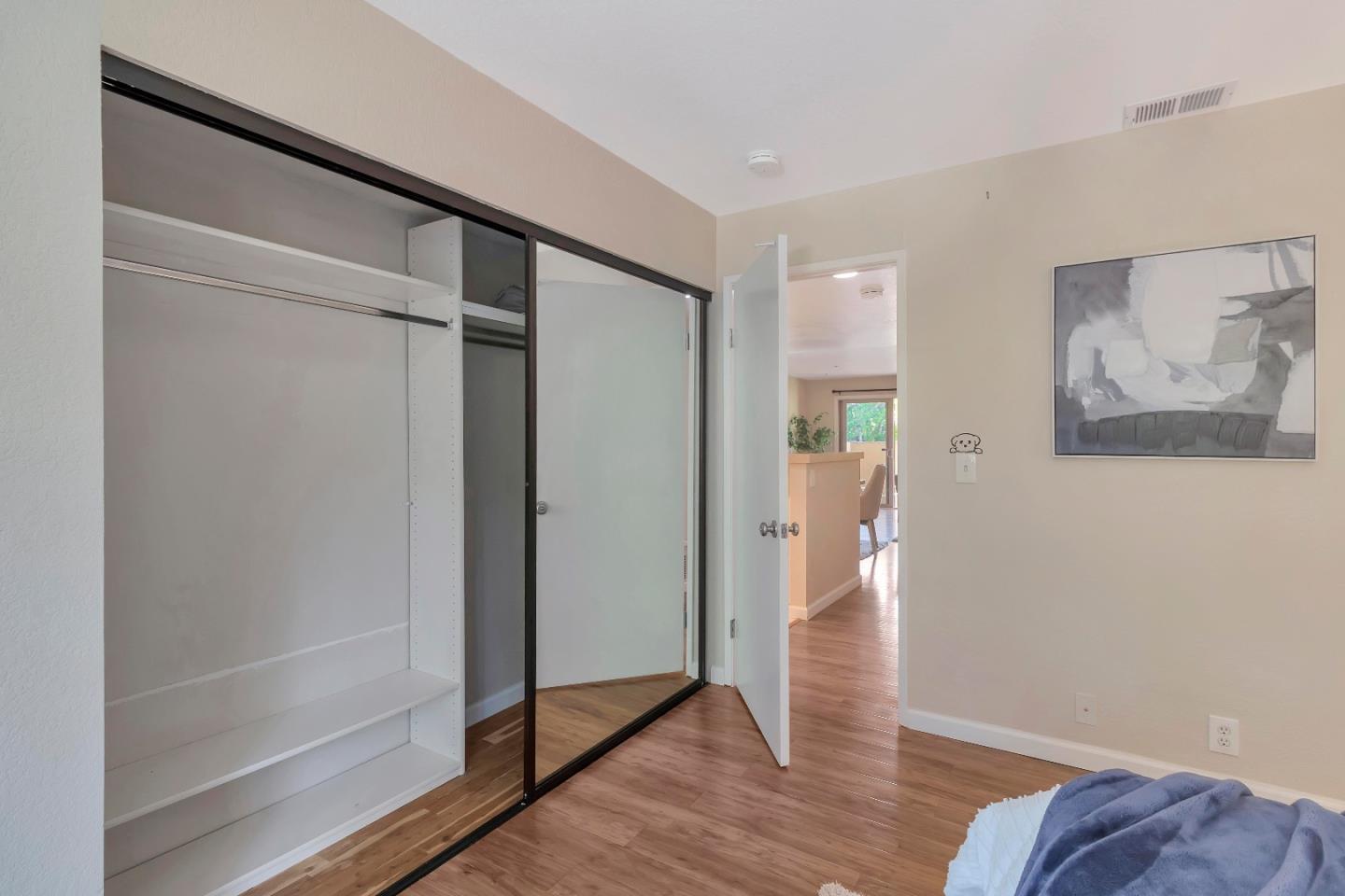 20682 Celeste Circle Cupertino, CA 95014 - Photo 18 of 31 a view of hallway with wooden floor