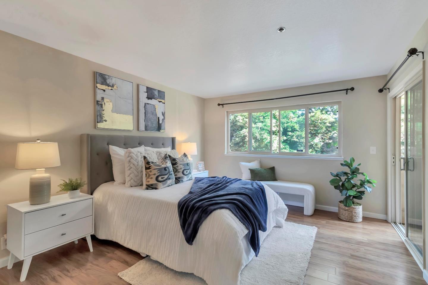 20682 Celeste Circle Cupertino, CA 95014 - Photo 20 of 31 a bedroom with a large bed and a window