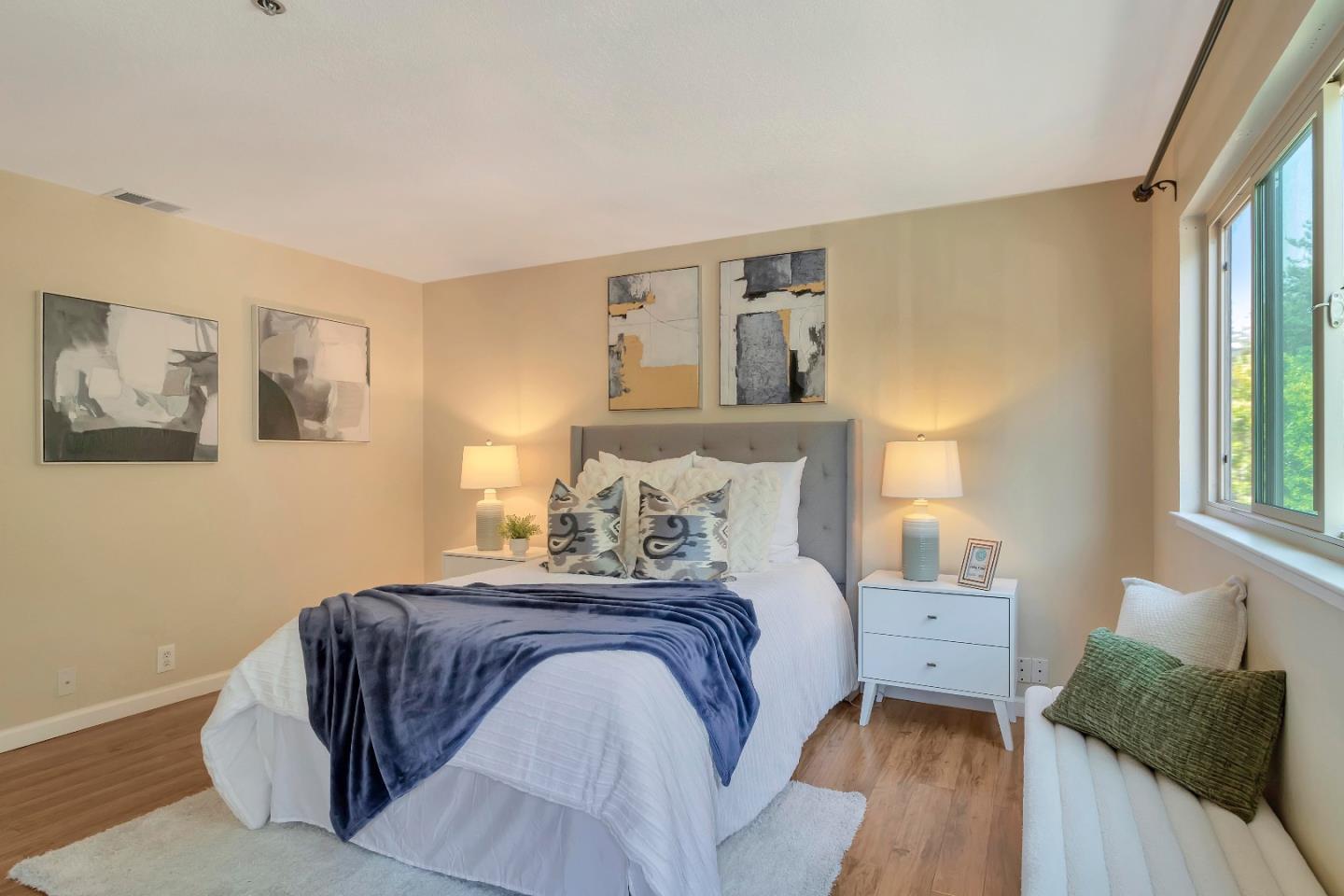 20682 Celeste Circle Cupertino, CA 95014 - Photo 24 of 31 a bedroom with a bed and wooden floor