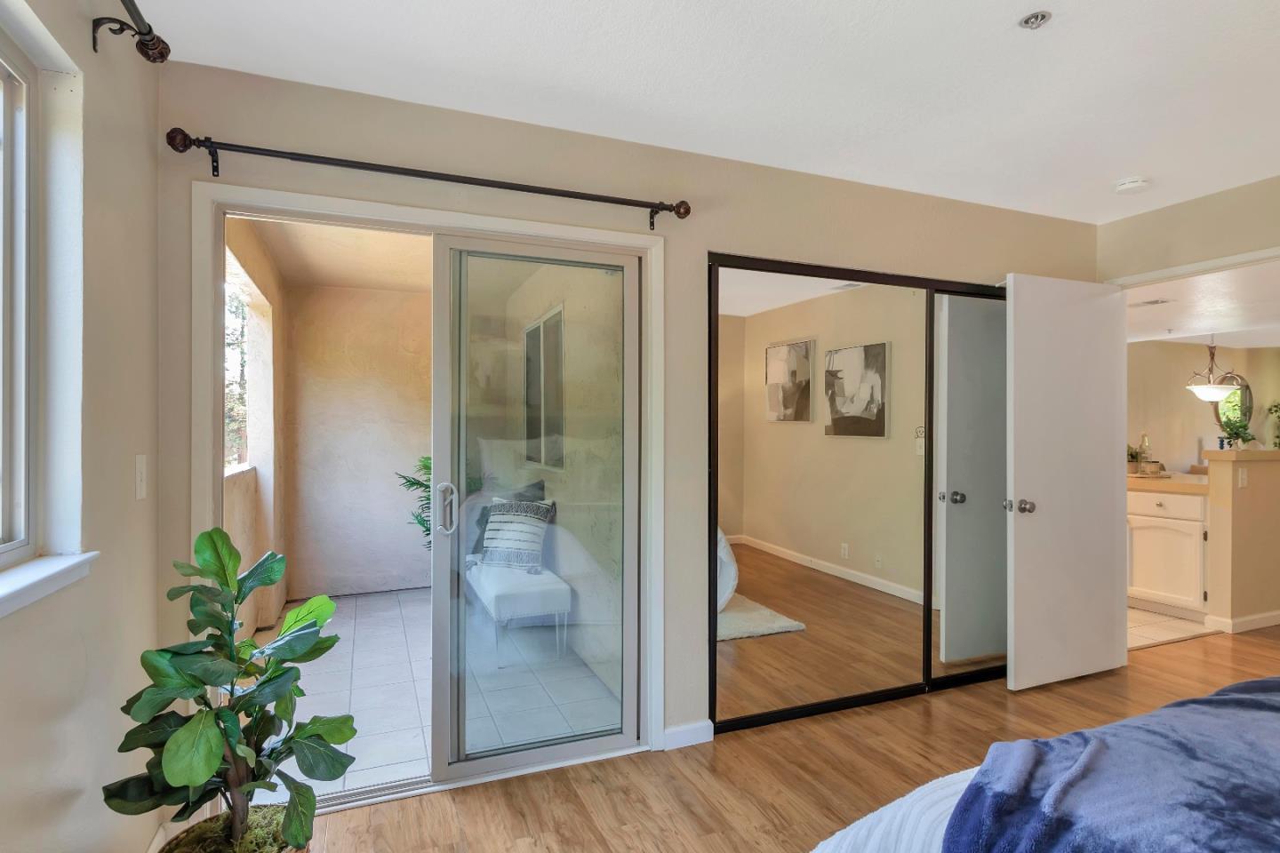 20682 Celeste Circle Cupertino, CA 95014 - Photo 25 of 31 a view of a hallway with wooden floor and front door