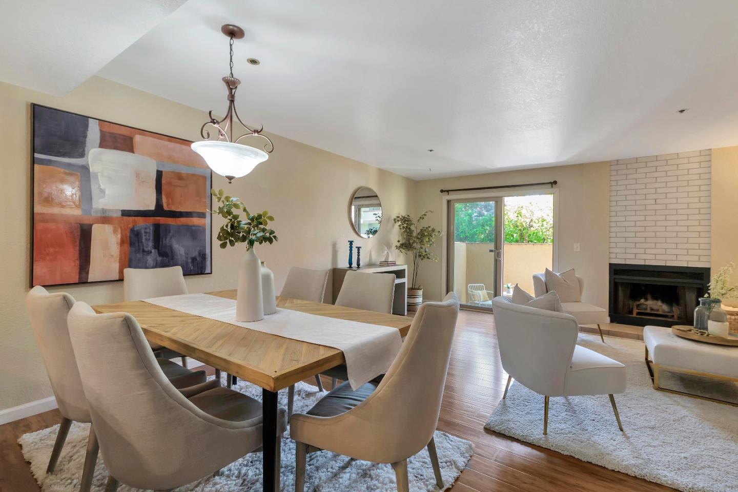 20682 Celeste Circle Cupertino, CA 95014 - Photo 26 of 31 a view of a dining room with furniture window and wooden floor