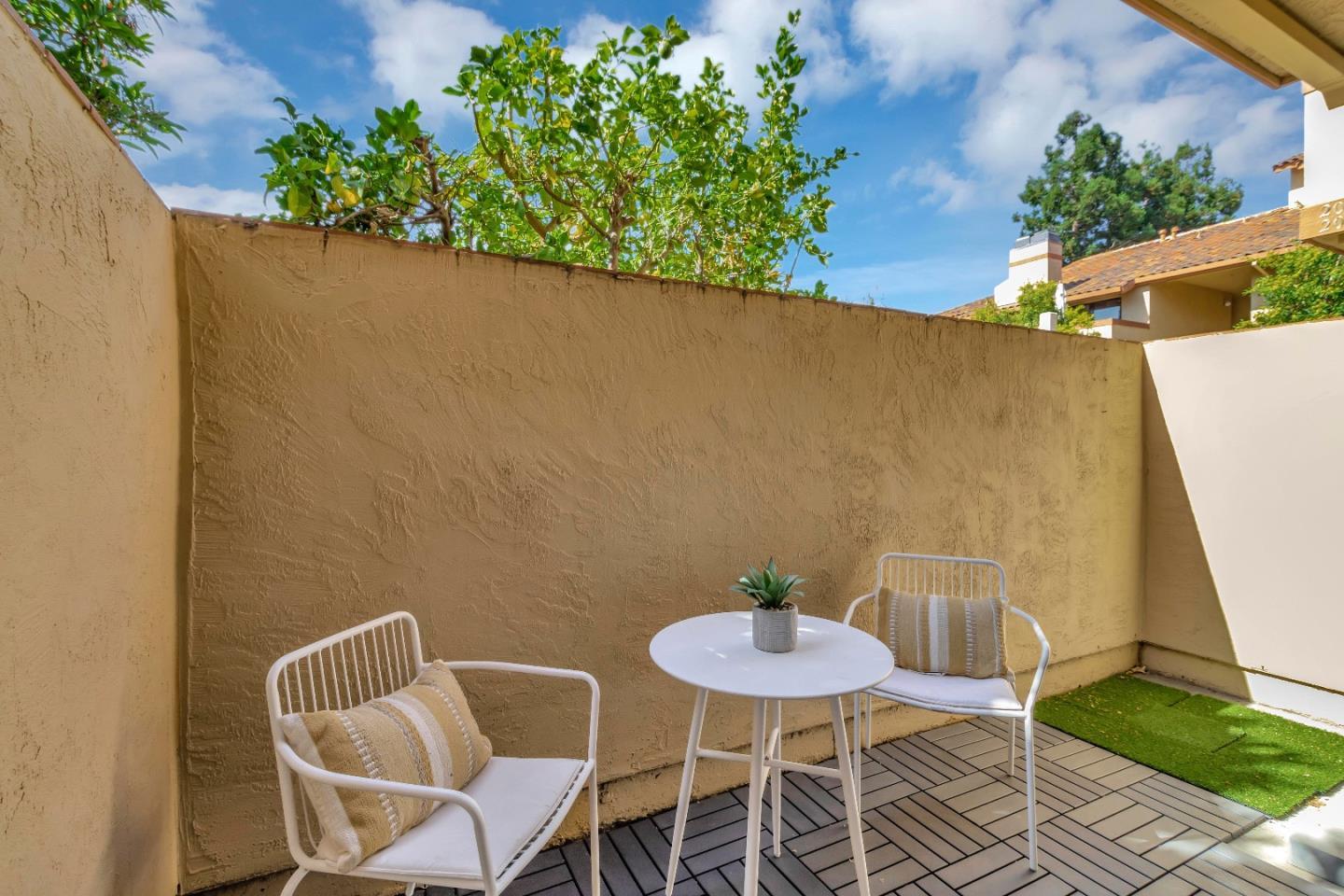 20682 Celeste Circle Cupertino, CA 95014 - Photo 30 of 31 a balcony with table and chairs