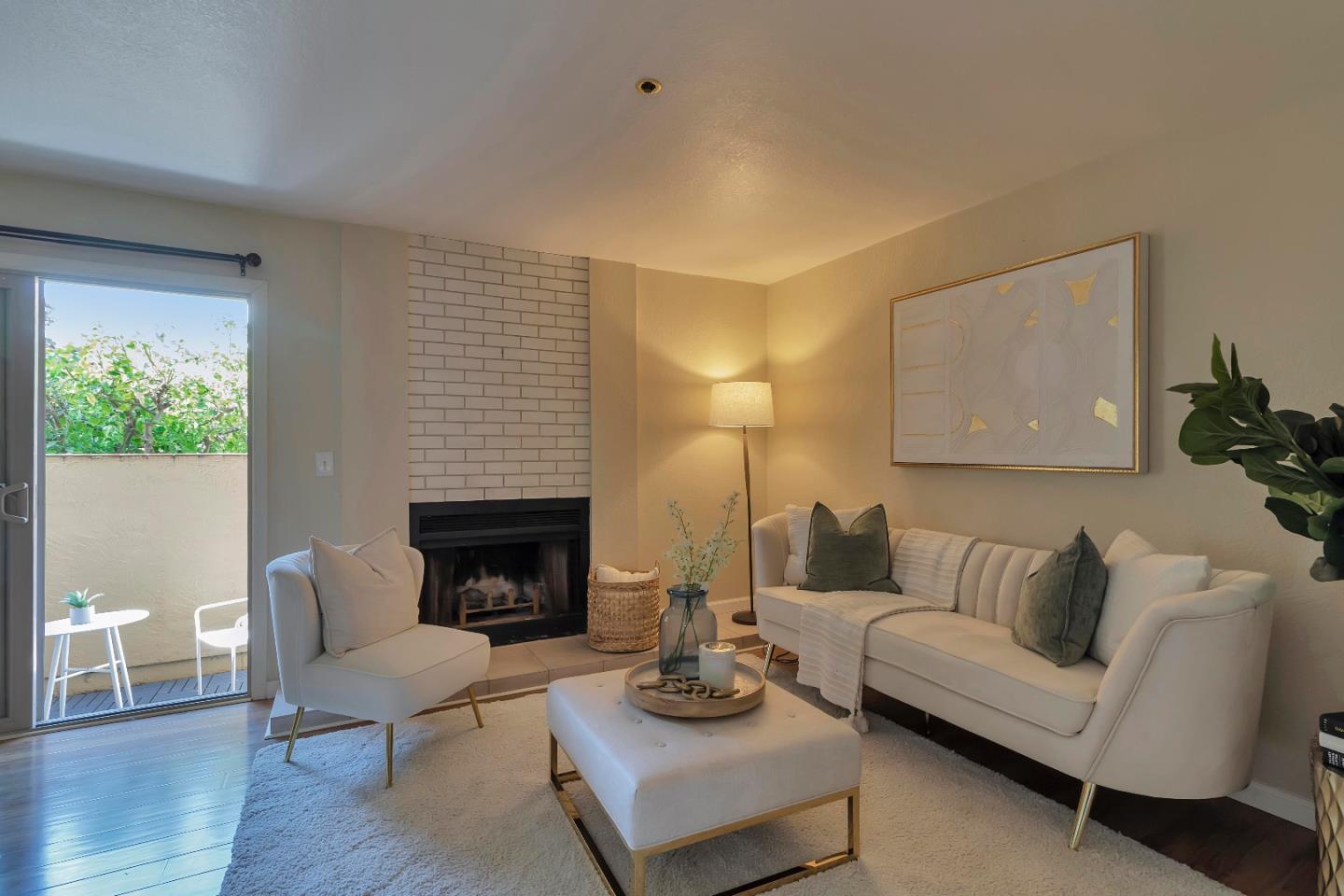 20682 Celeste Circle Cupertino, CA 95014 - Photo 6 of 31 a living room with furniture and a fireplace