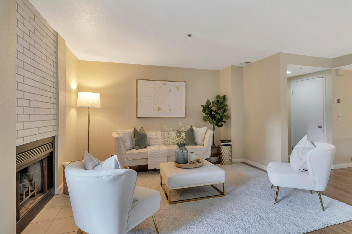 20682 Celeste Circle Cupertino, CA 95014 - Photo 7 of 31 a living room with furniture and a fireplace
