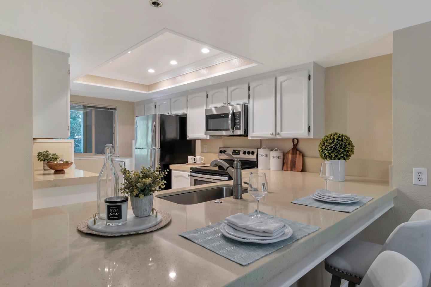 20682 Celeste Circle Cupertino, CA 95014 - Photo 10 of 31 a kitchen with a table and chairs