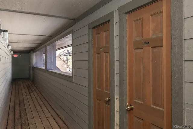 a view of a house with a snow in the yard