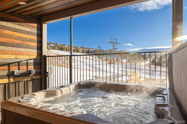 a dining space with table and chairs