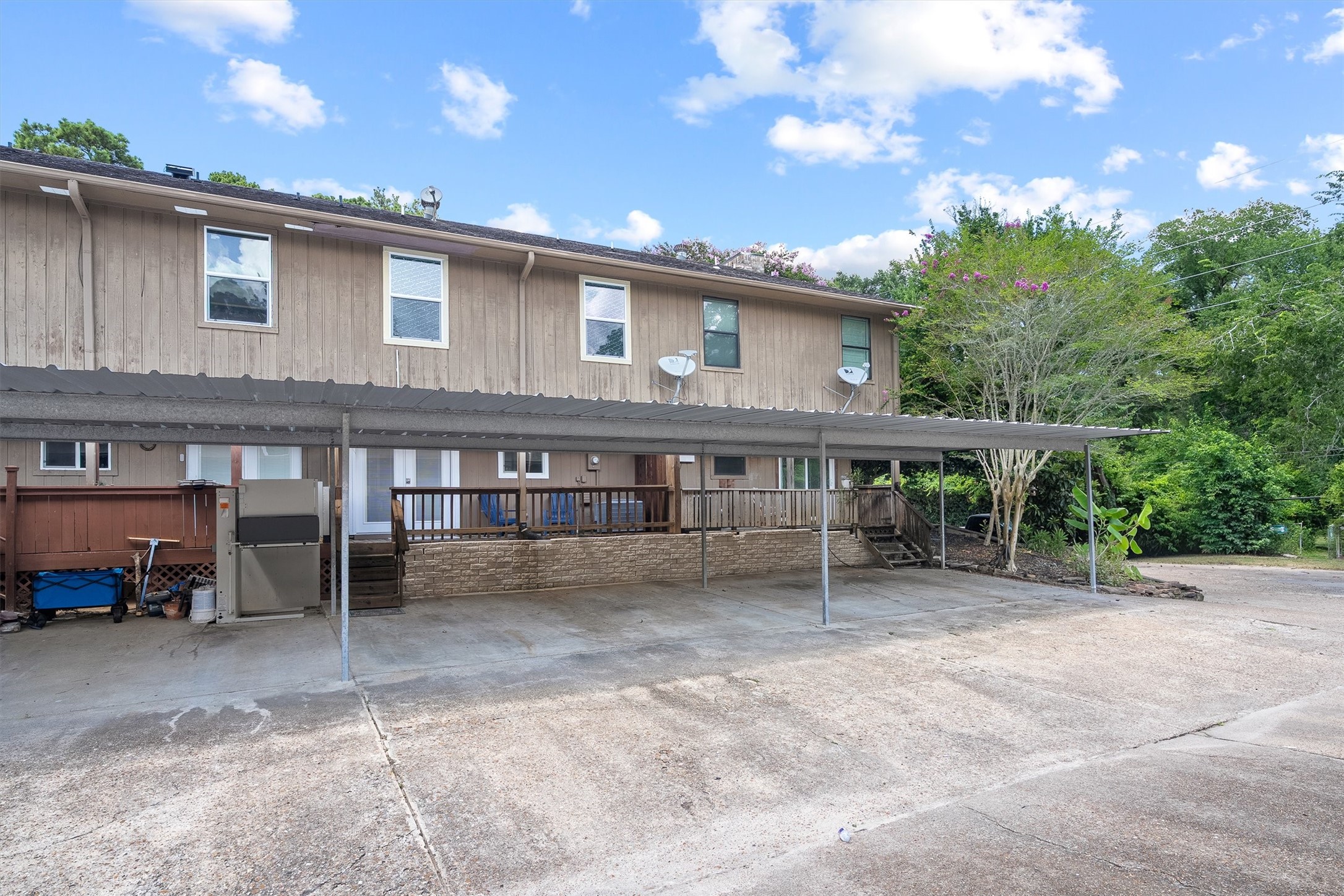 1011 Hamblen Road, Unit 306 Houston, TX 77339 - Photo 27 of 38 An assigned 2-car covered carport keeps parking easy and protected, with additional parking also available nearby.