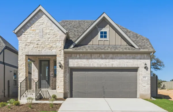 a view of front of house with garage