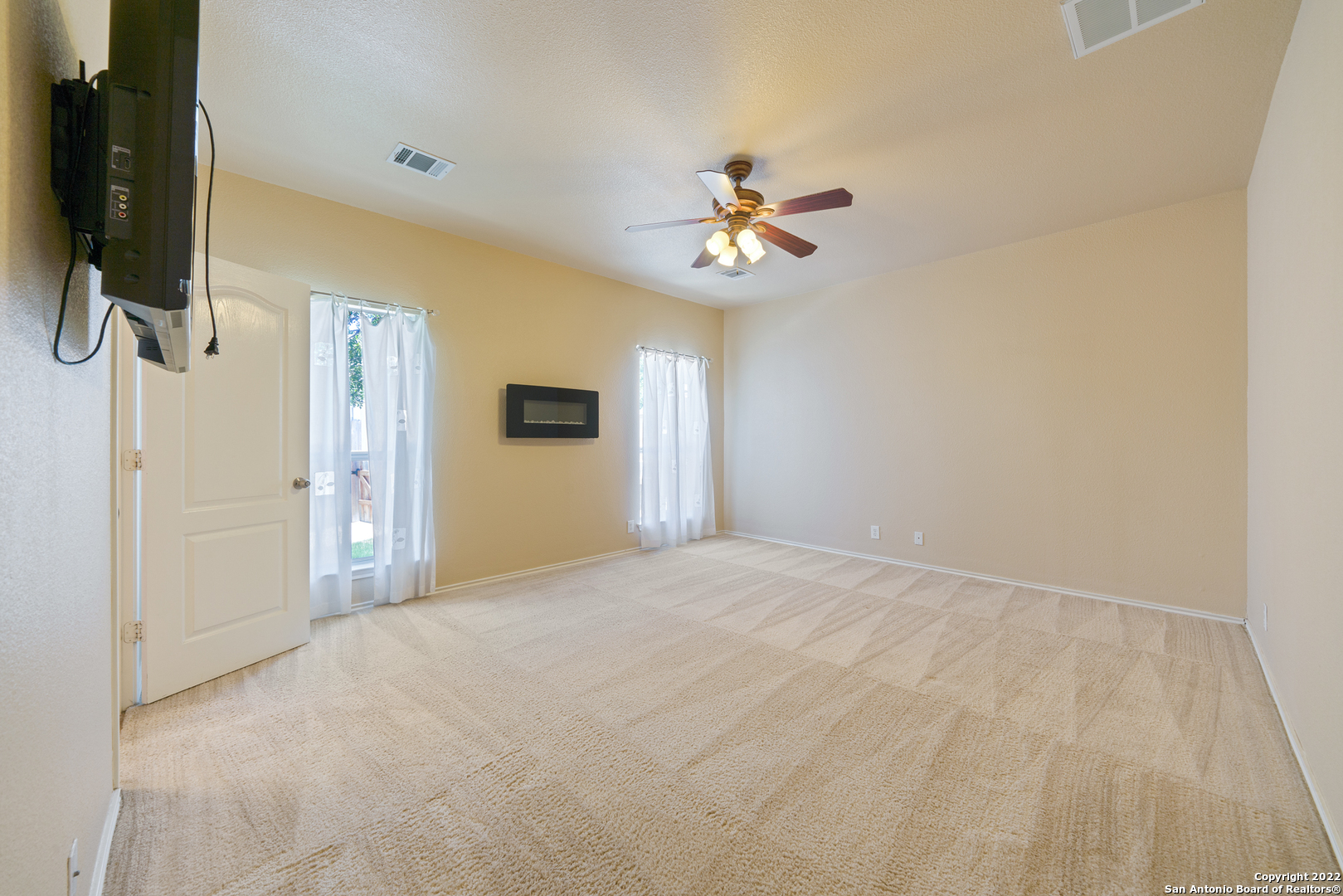 308 Rustic Trail Cibolo, TX 78108 - Photo 15 of 25 a view of empty room with a fireplace