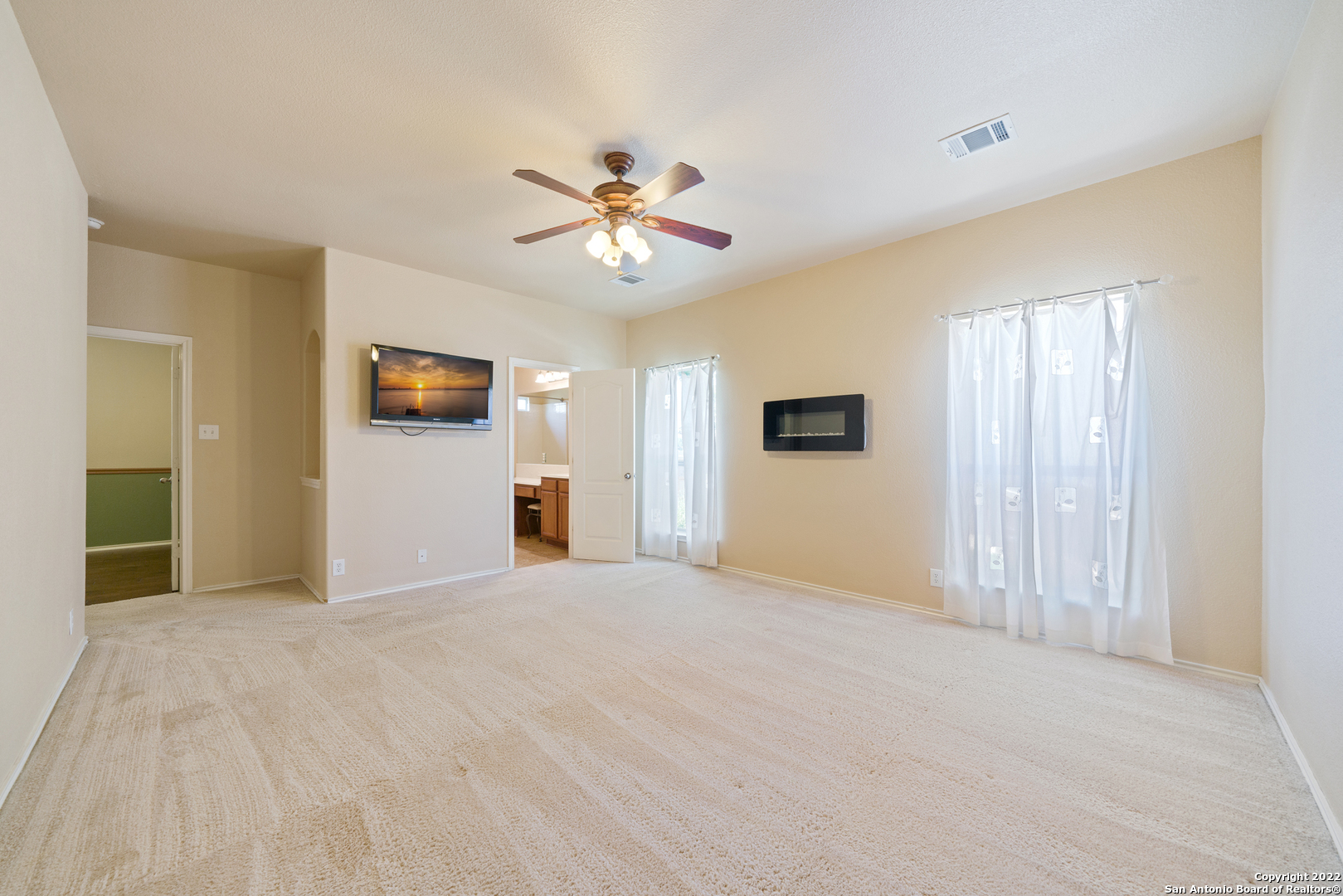 308 Rustic Trail Cibolo, TX 78108 - Photo 16 of 25 a view of empty room with window and ceiling fan