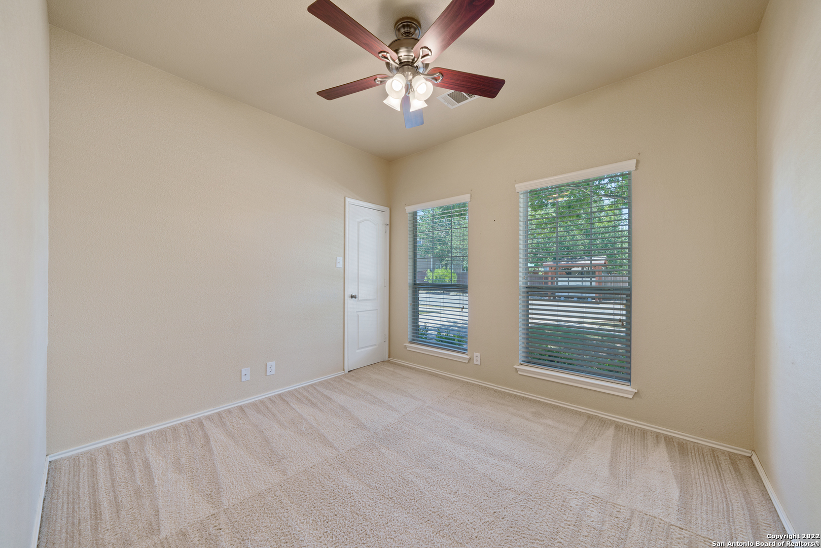 308 Rustic Trail Cibolo, TX 78108 - Photo 19 of 25 a view of an empty room with a window