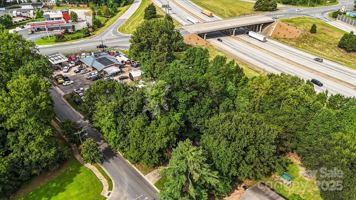 734 Dewolfe Street Charlotte, NC 28208 - Photo 4 of 9 a view of a yard with plants