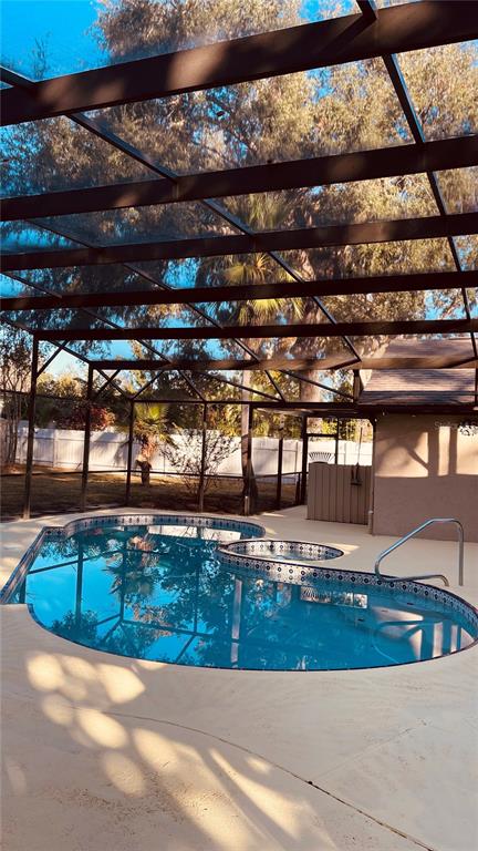 6850 Spring Rain Drive Orlando, FL 32819 - Photo 30 of 35 a view of a indoor swimming pool