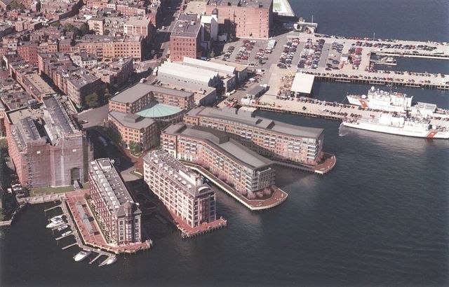 a view of a livingroom with furniture and chandelier