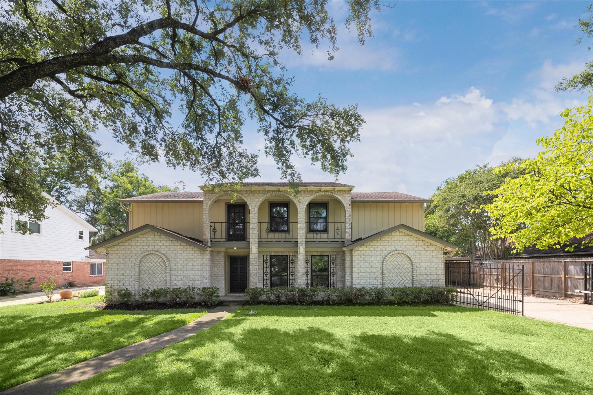2723 Bernadette Lane Houston, TX 77043 - Photo 1 of 32 a view of a yard in front of a house with a large tree