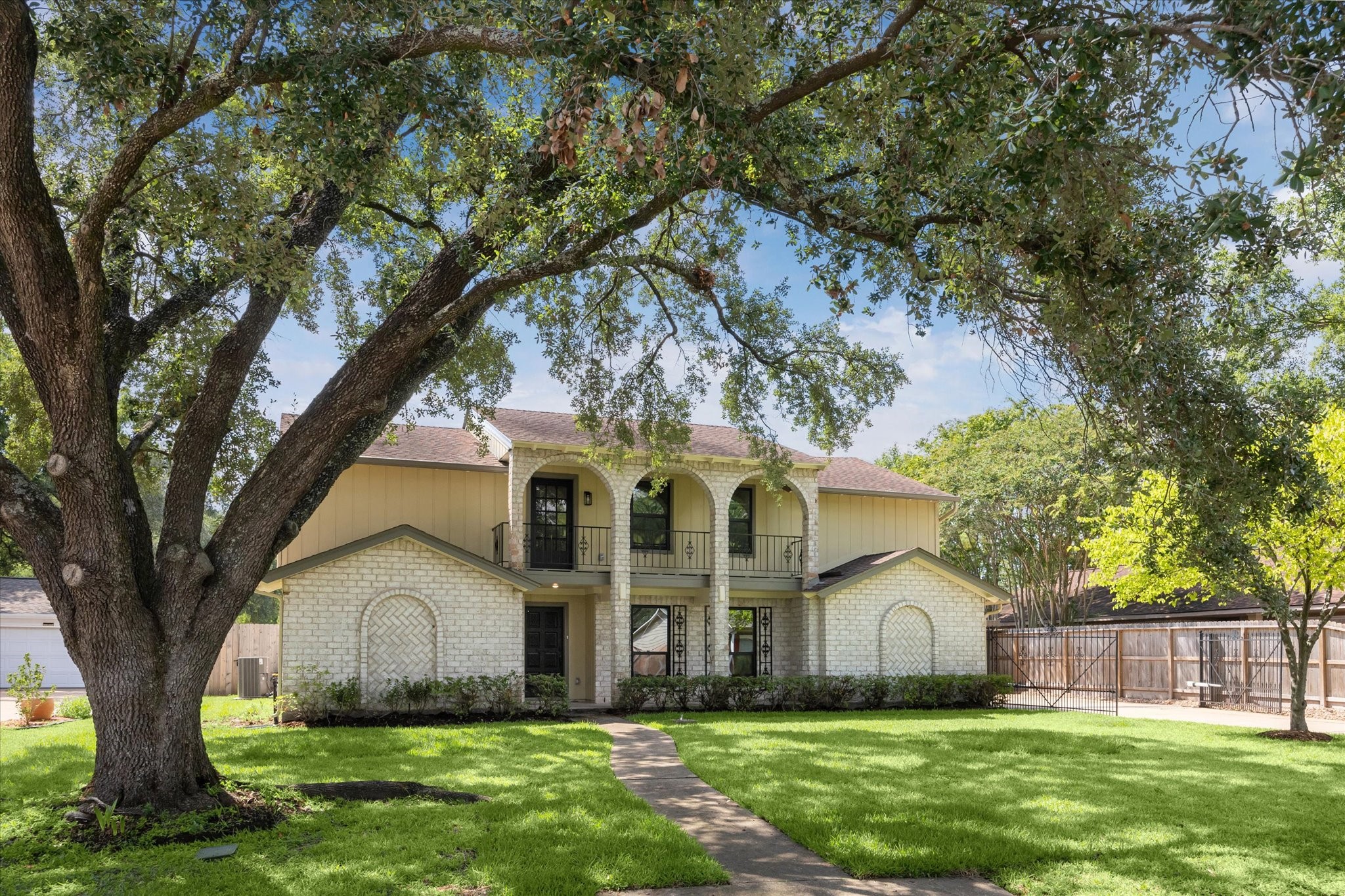 2723 Bernadette Lane Houston, TX 77043 - Photo 2 of 32 a front view of house with yard
