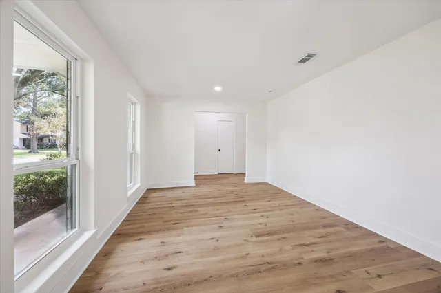a view of an empty room and window