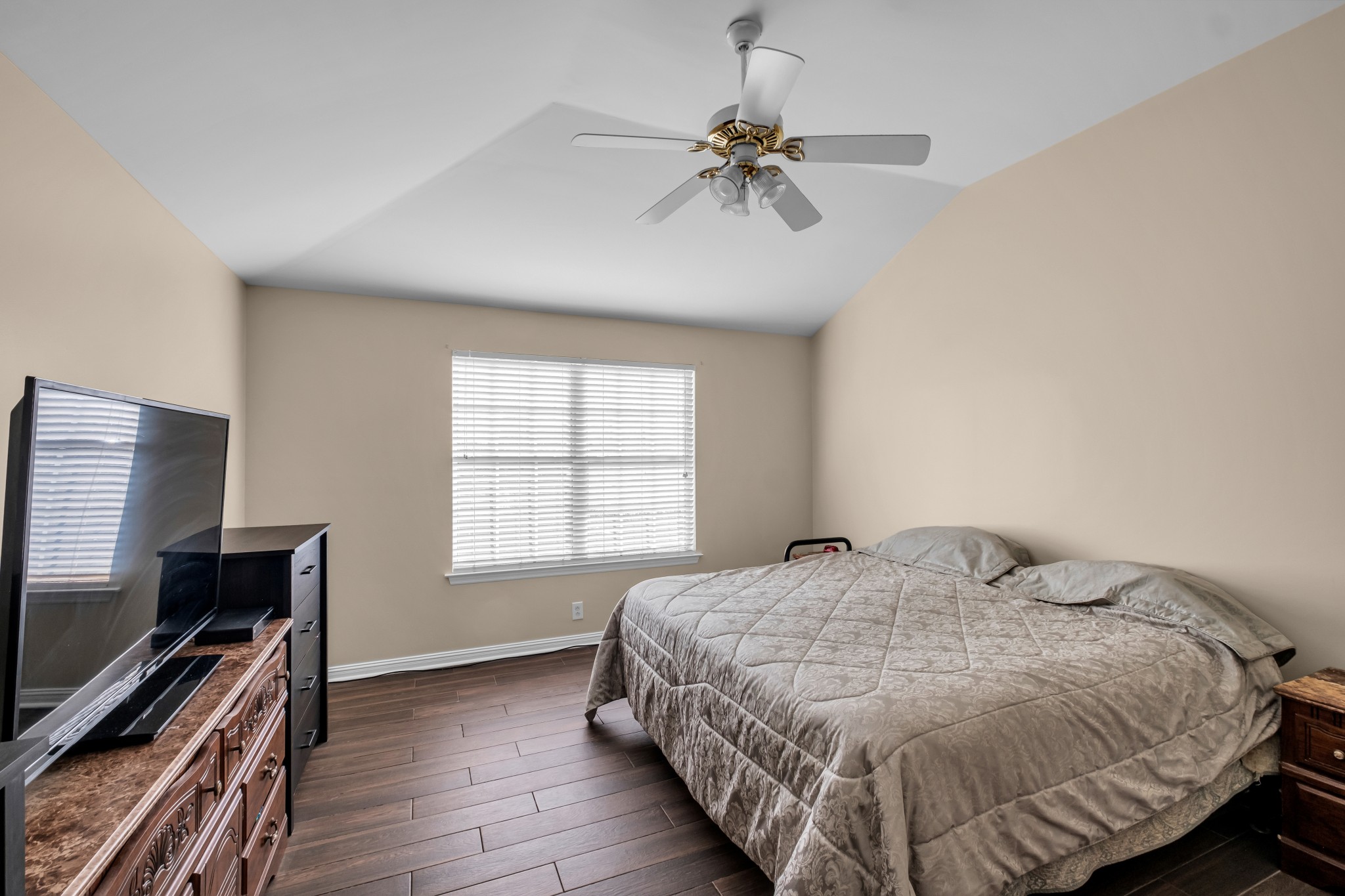 2172 Spring Hill Circle Spring Hill, TN 37174 - Photo 15 of 29 a bedroom with a bed and a flat screen tv