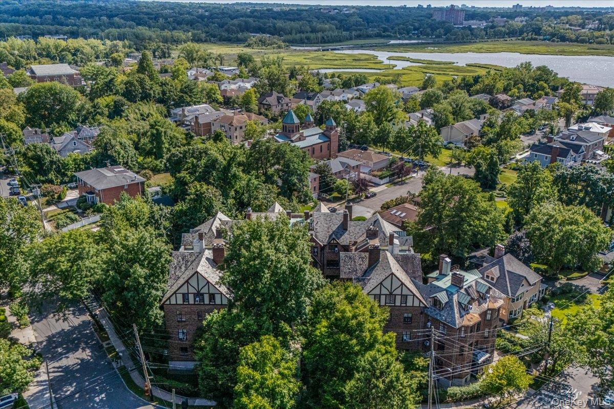 38-30 Douglaston Parkway, Unit G2 Queens, NY 11363 - Photo 19 of 19 an aerial view of multiple house