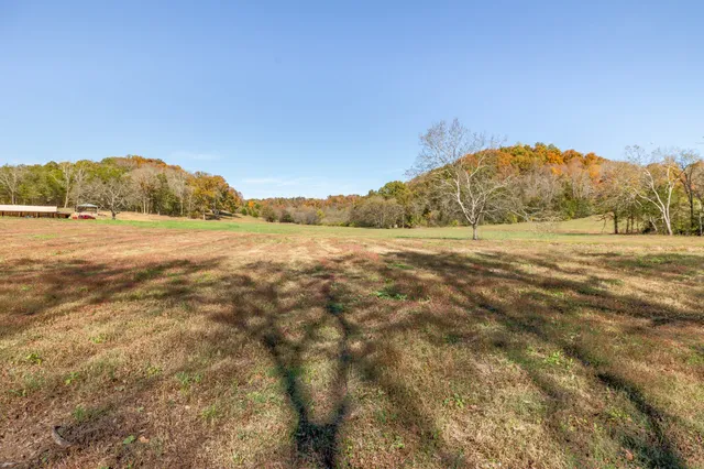 a view of an ocean beach and mountain