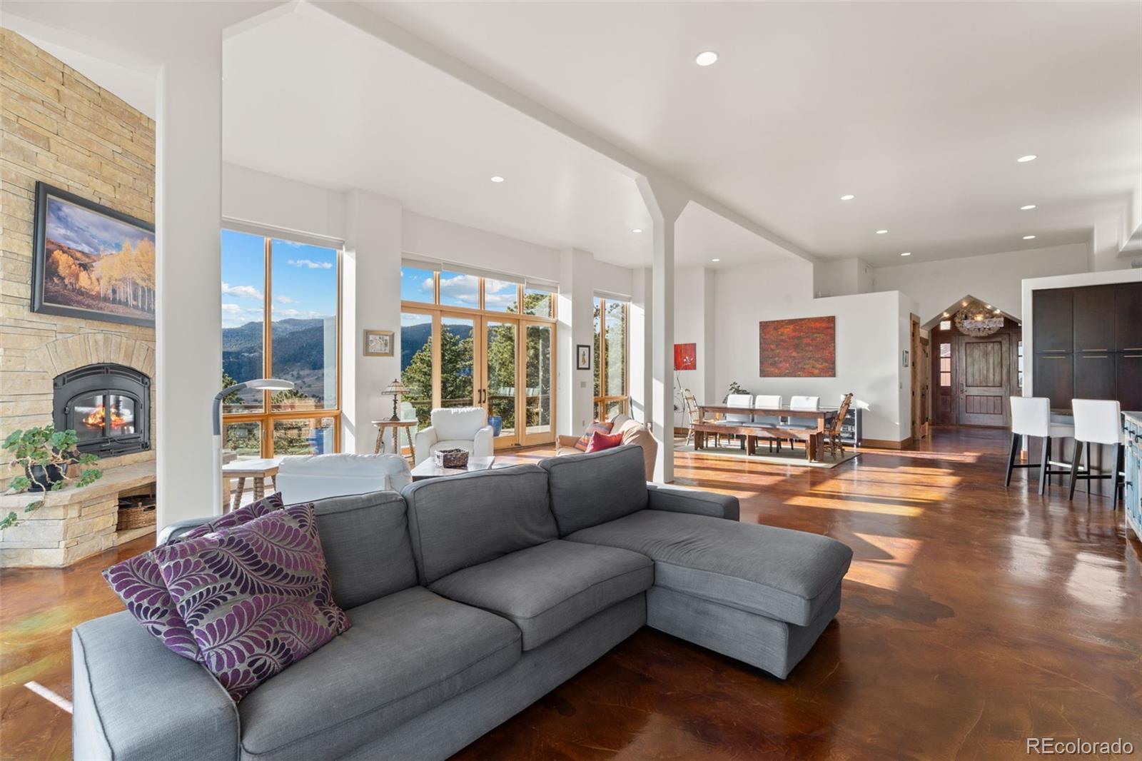 27659 Misty Road Golden, CO 80403 - Photo 16 of 50 a living room with furniture and wooden floor