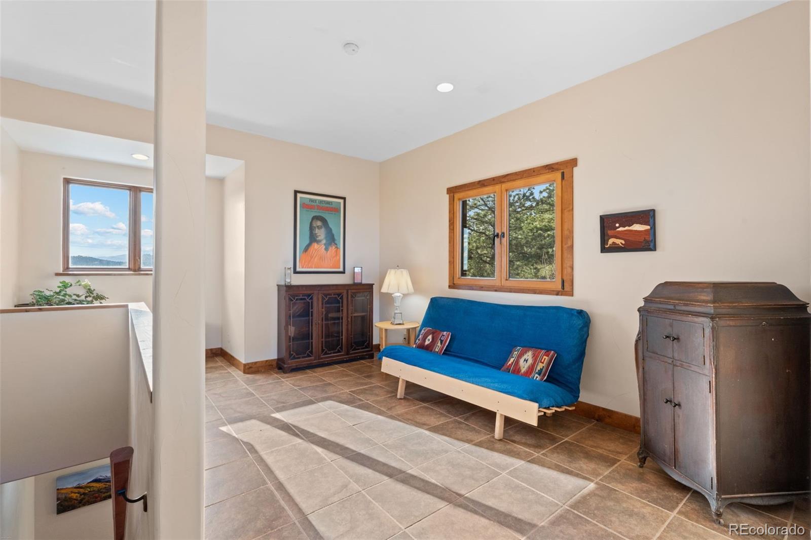 27659 Misty Road Golden, CO 80403 - Photo 32 of 50 a living room with furniture and a window