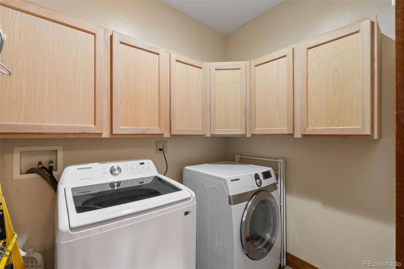 27659 Misty Road Golden, CO 80403 - Photo 38 of 50 a utility room with dryer and washer