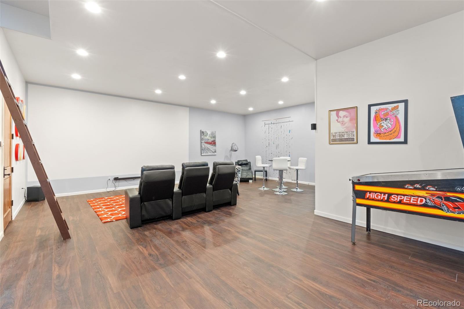 27659 Misty Road Golden, CO 80403 - Photo 40 of 50 a living room with furniture and a wooden floor