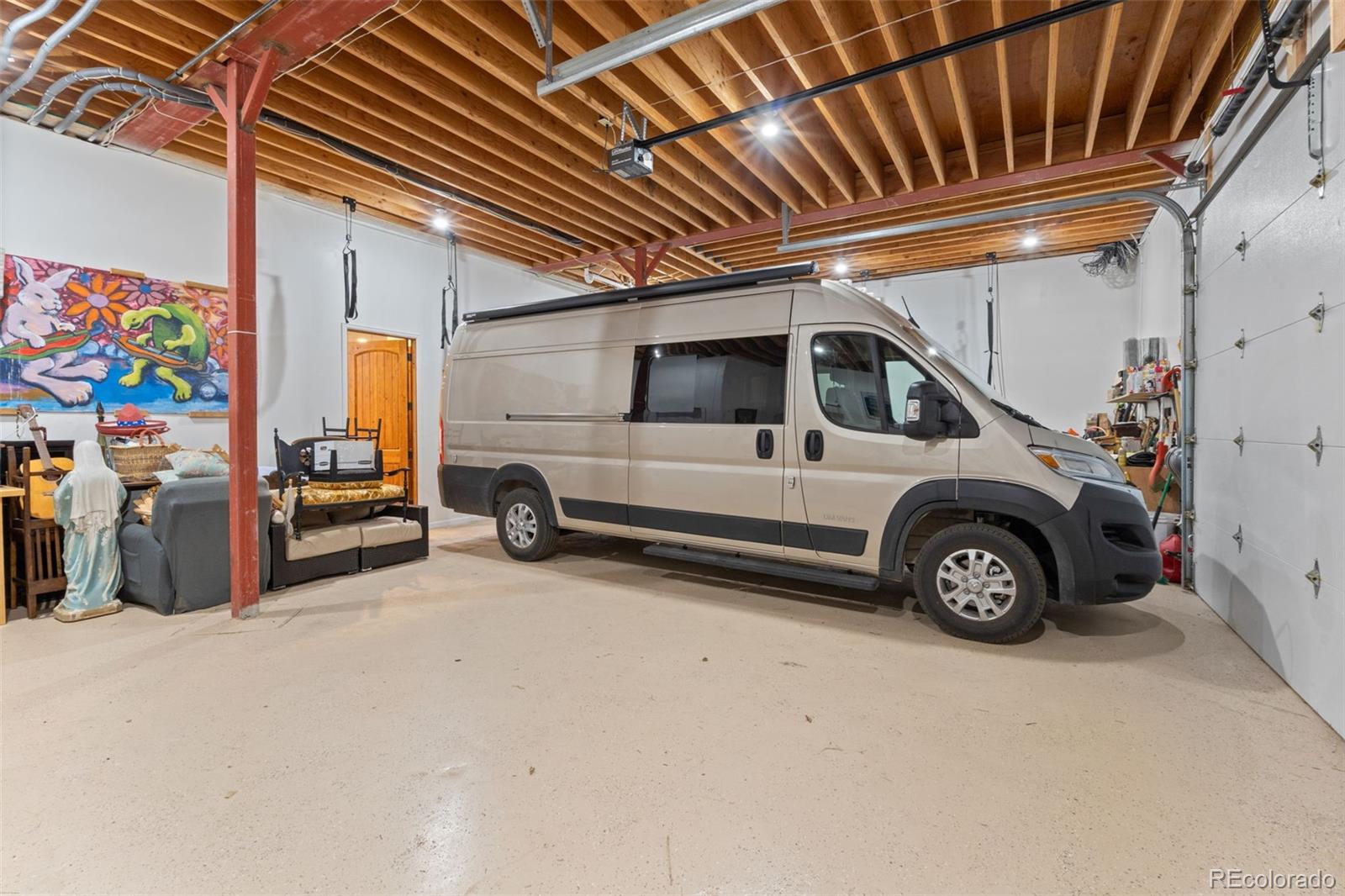 27659 Misty Road Golden, CO 80403 - Photo 43 of 50 a view of a car in garage