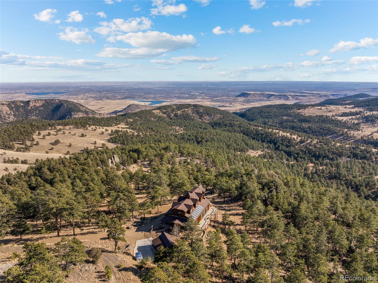27659 Misty Road Golden, CO 80403 - Photo 47 of 50 an aerial view of residential house and green space