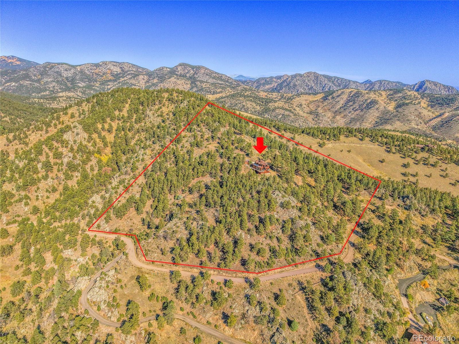 27659 Misty Road Golden, CO 80403 - Photo 48 of 50 a view of a mountain with a mountain