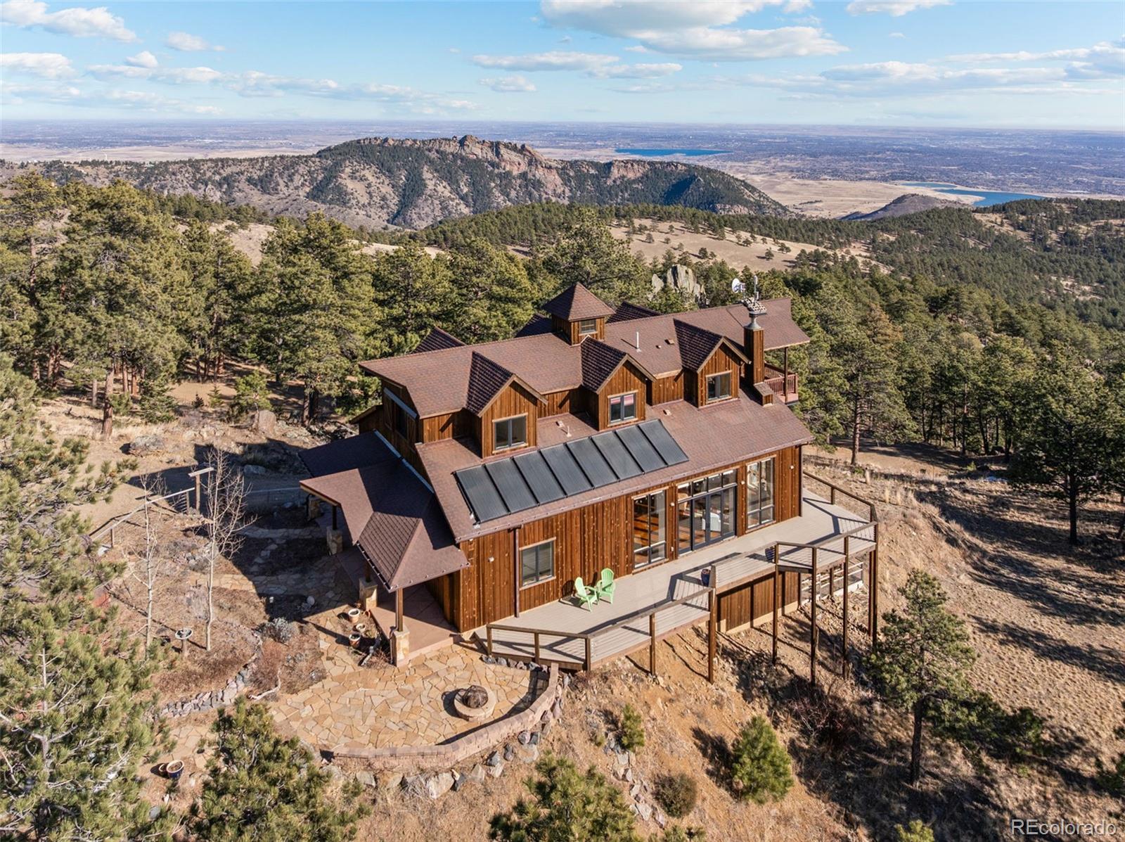 27659 Misty Road Golden, CO 80403 - Photo 8 of 50 an aerial view of a house with a mountain
