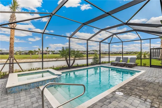a view of a swimming pool with a porch