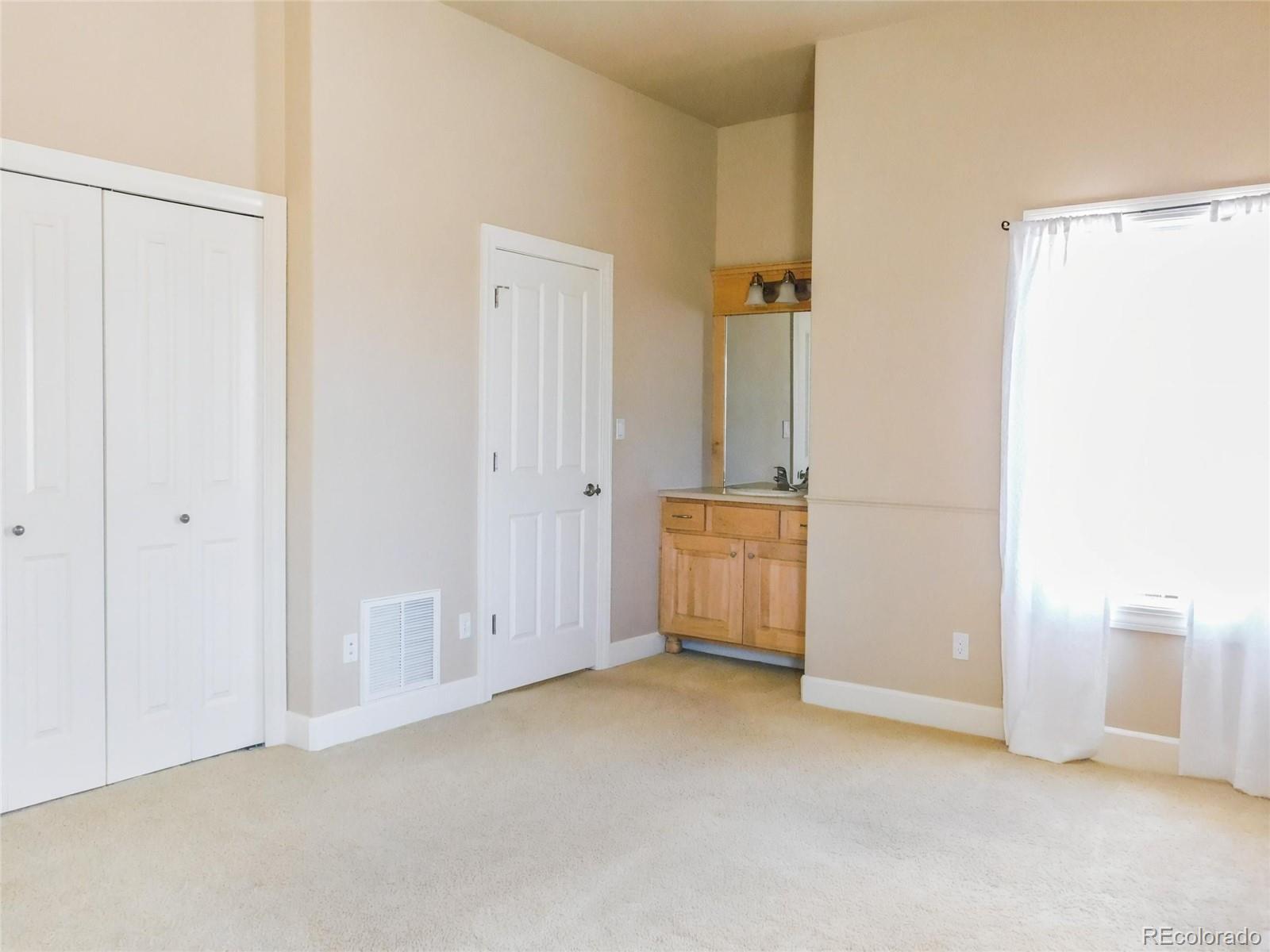 4351 Little Burnt Mill Road Pueblo, CO 81004 - Photo 11 of 45 a view of a room with utility room