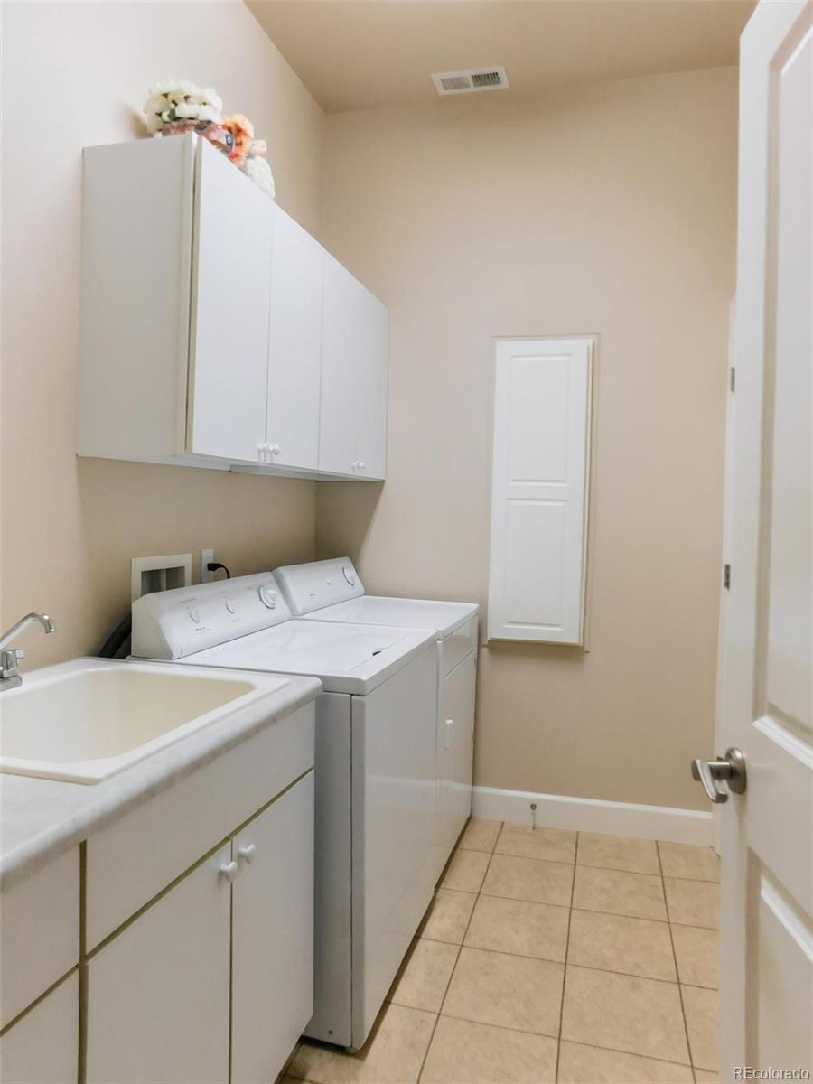 4351 Little Burnt Mill Road Pueblo, CO 81004 - Photo 15 of 45 a utility room with dryer and washer