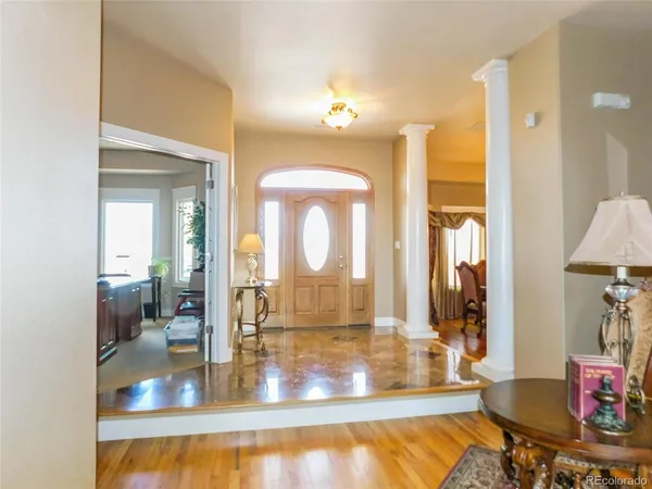 a view of a living room and a swimming pool
