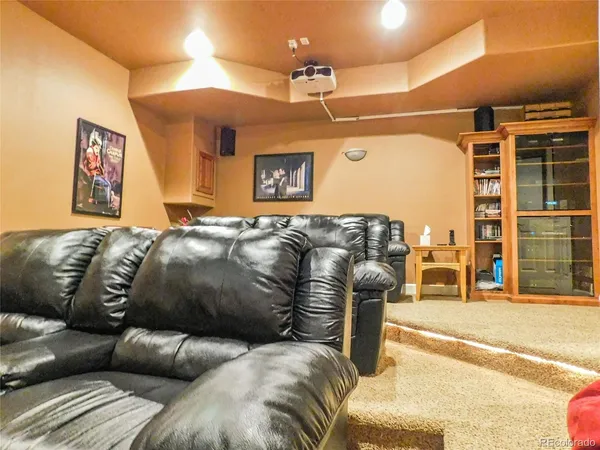 a living room with a couch and a flat screen tv
