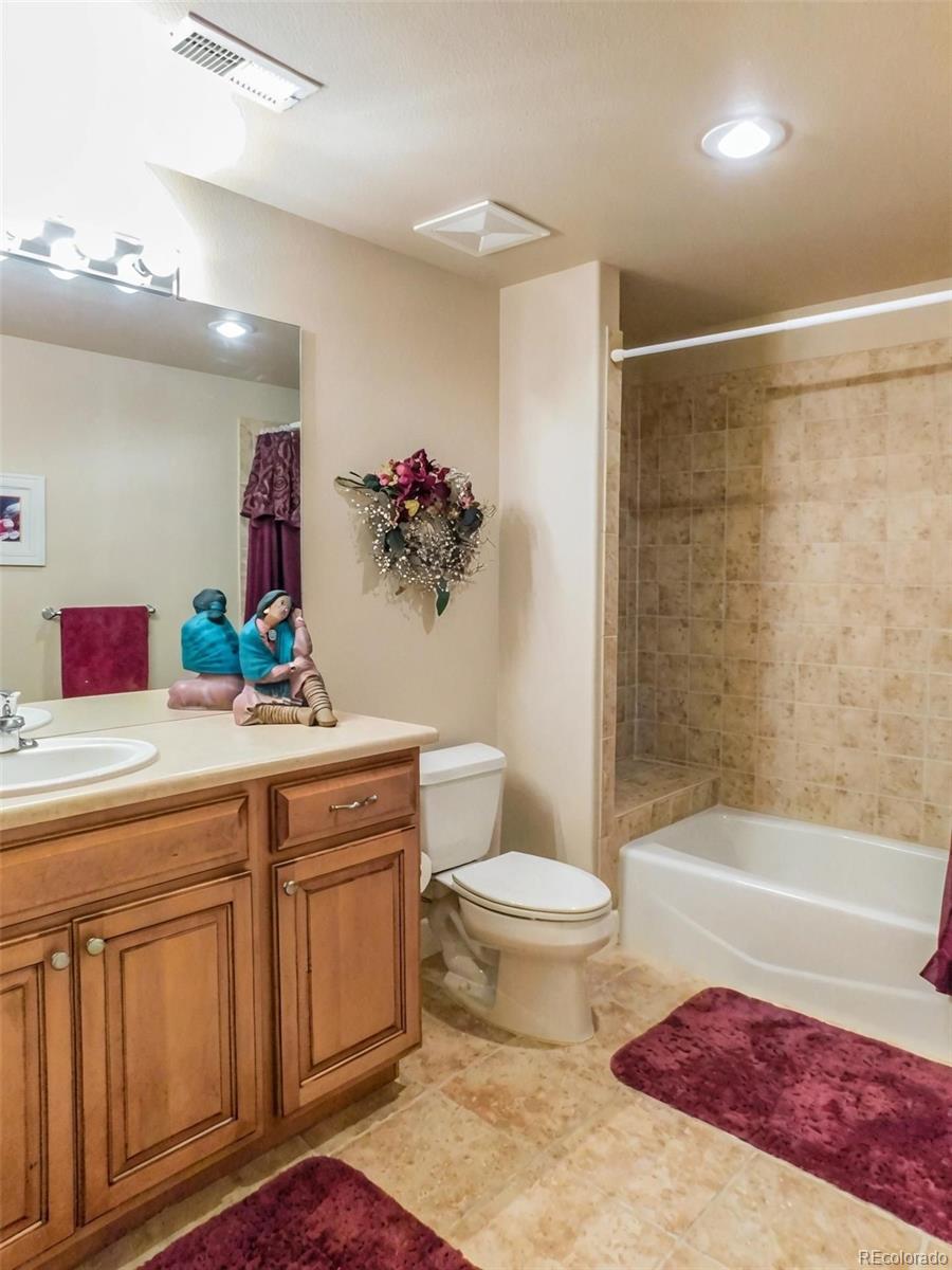 4351 Little Burnt Mill Road Pueblo, CO 81004 - Photo 26 of 45 a bathroom with a sink a toilet and shower