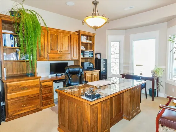 a kitchen that has a lot of cabinets in it