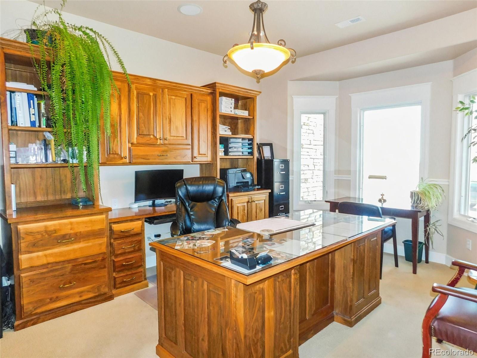 4351 Little Burnt Mill Road Pueblo, CO 81004 - Photo 3 of 45 a kitchen that has a lot of cabinets in it