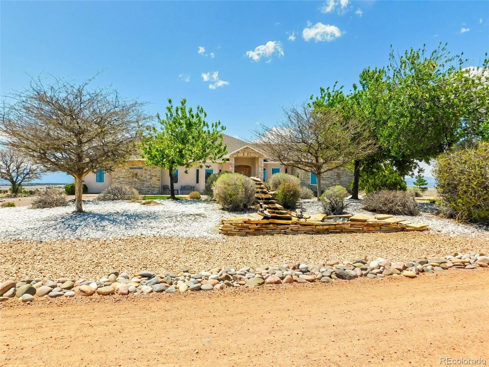 4351 Little Burnt Mill Road Pueblo, CO 81004 - Photo 34 of 45 a view of a yard with a tree
