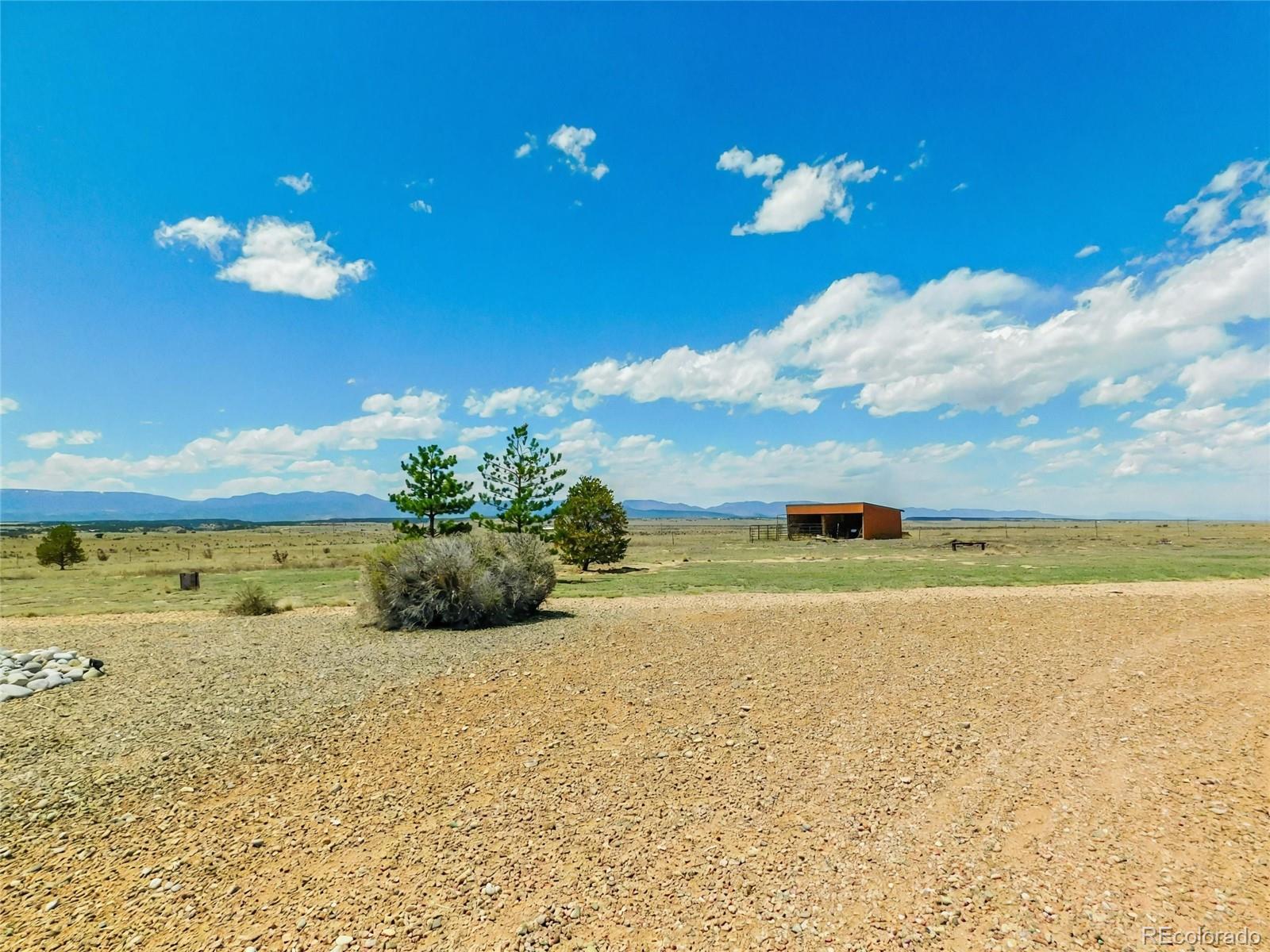 4351 Little Burnt Mill Road Pueblo, CO 81004 - Photo 43 of 45 a view of a lake with a big yard