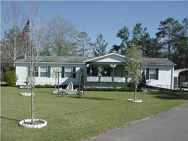 4397 Rebecca Road Crestview, FL 32539 - Photo 15 of 16 a view of a house with garden