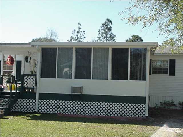 4397 Rebecca Road Crestview, FL 32539 - Photo 9 of 16 a view of a house with a large window