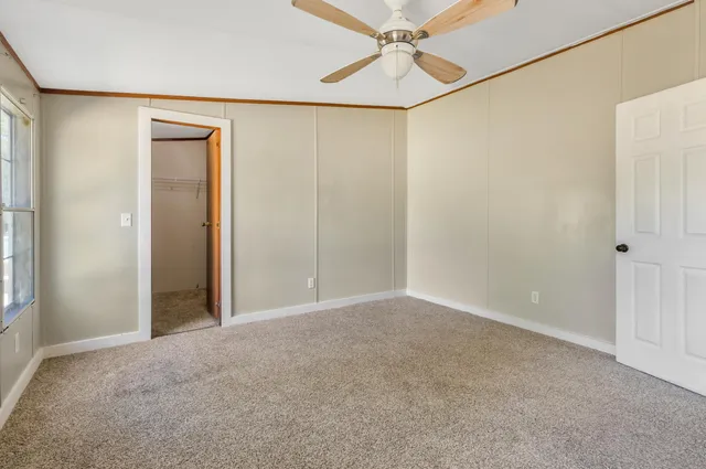 a view of storage and utility room with washer and dryer