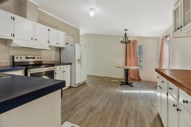 a view of a backyard with a house