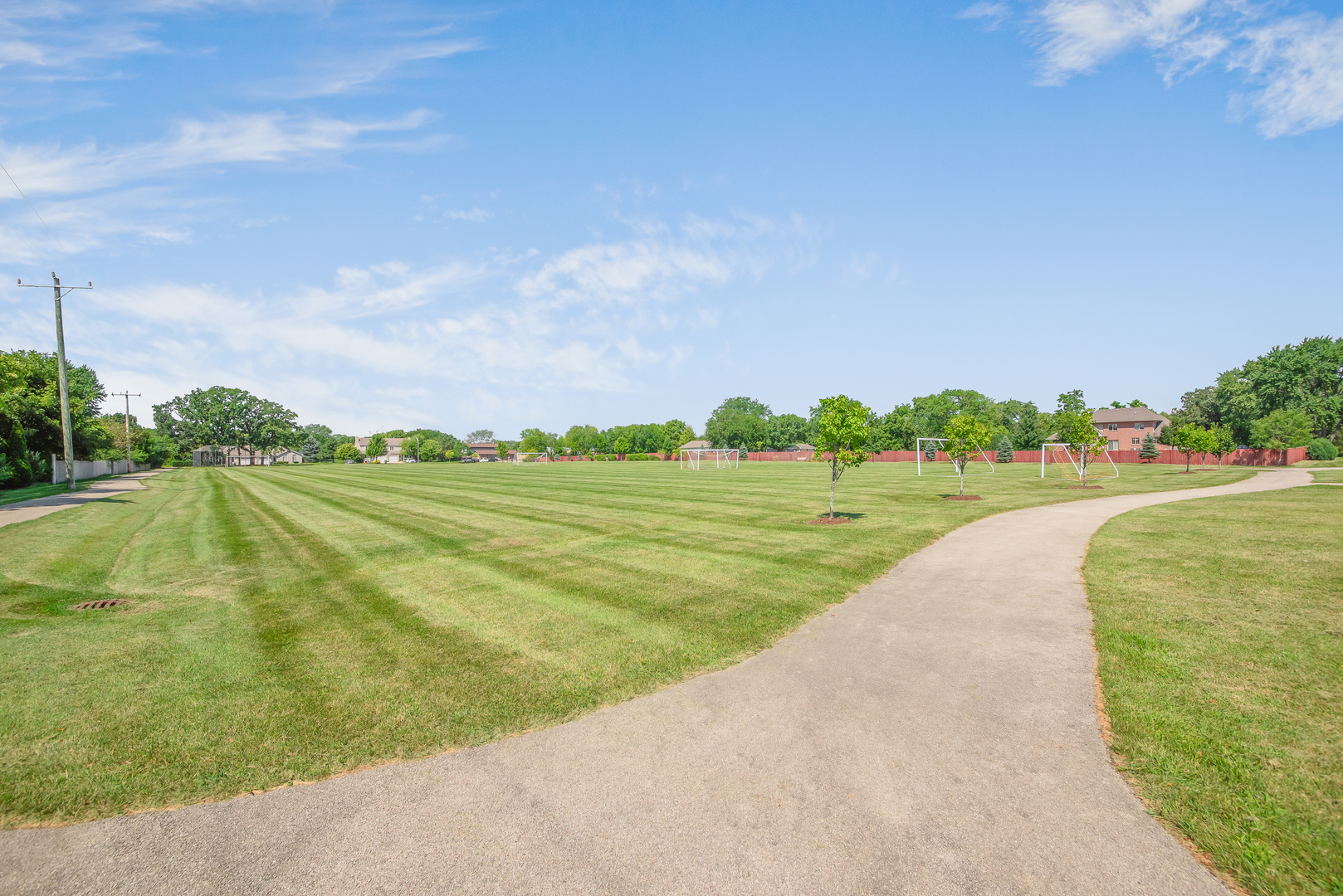 200 Beechwood Drive Minooka, IL 60447 - Photo 21 of 26 a view of a swimming pool and a yard