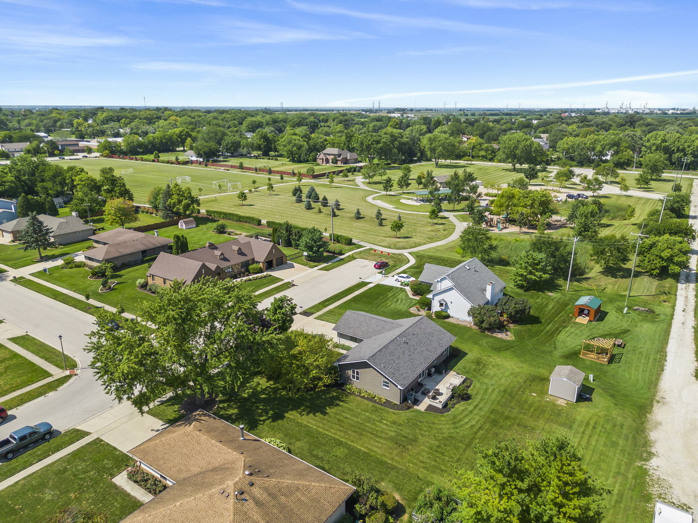 200 Beechwood Drive Minooka, IL 60447 - Photo 23 of 26 an aerial view of residential houses with outdoor space and trees