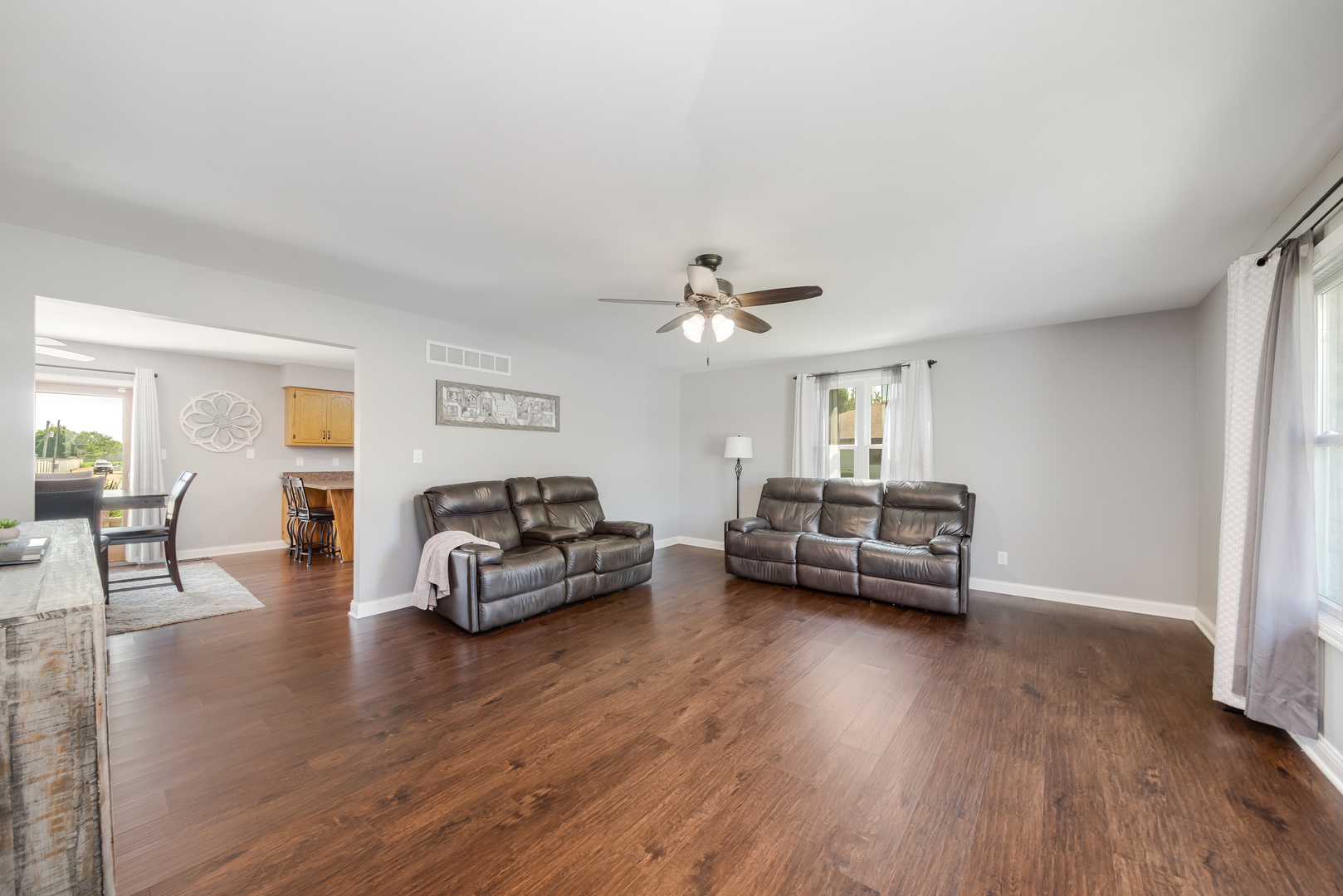 200 Beechwood Drive Minooka, IL 60447 - Photo 3 of 26 a living room with furniture and a wooden floor